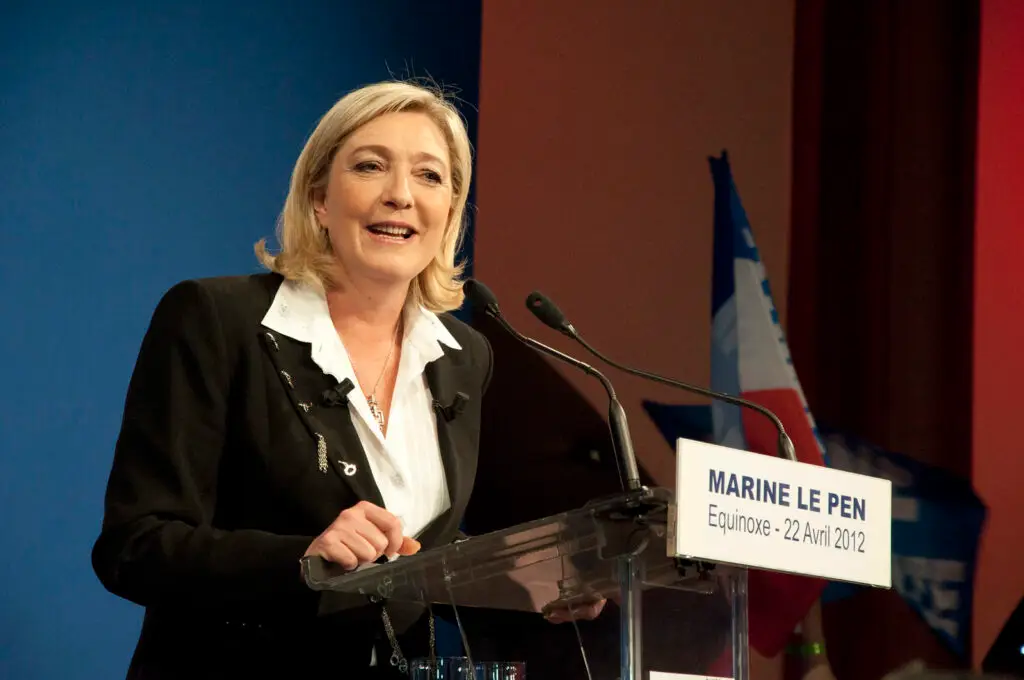 Le Pen’s Party Leads First Round, Macron Allies Struggle in Snap Election